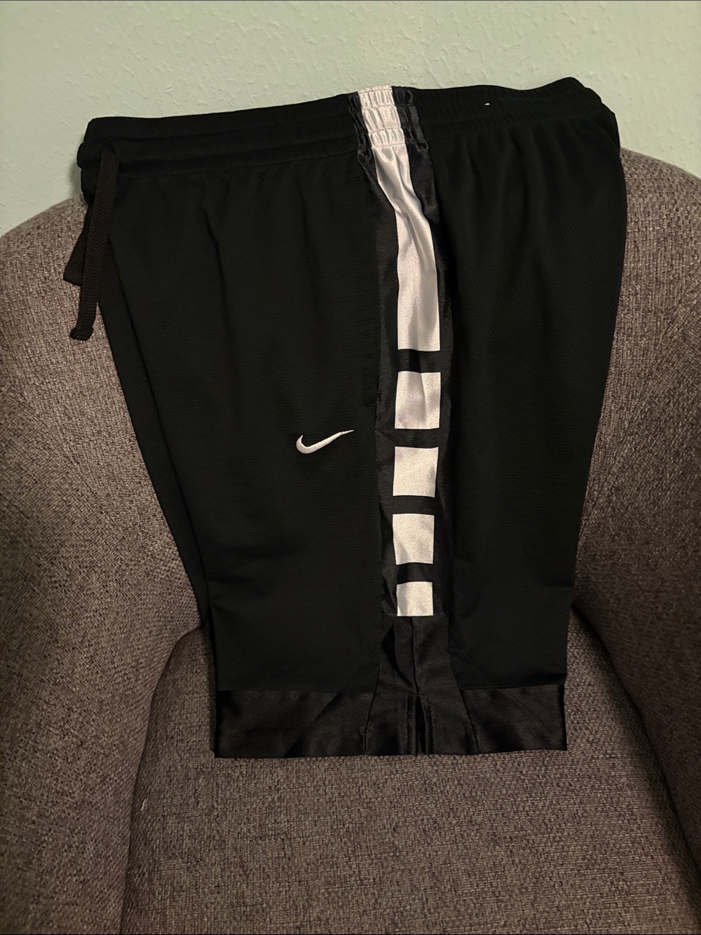 Nike Black Athletic Shorts with White Vertical Accent